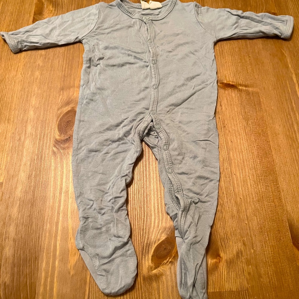 Light grey button down KYTE baby footie. Good condition. Some pilling. No stains